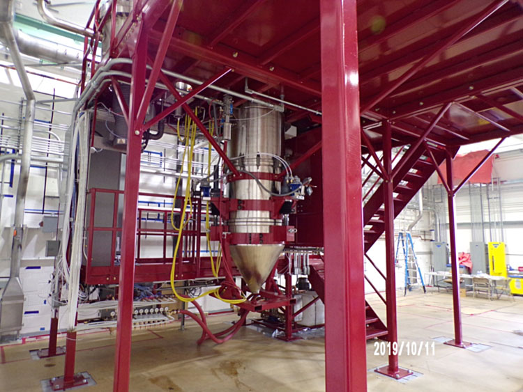 Arcast dual plasma melting tube feed inert gas atomizer for reactive metal powder production